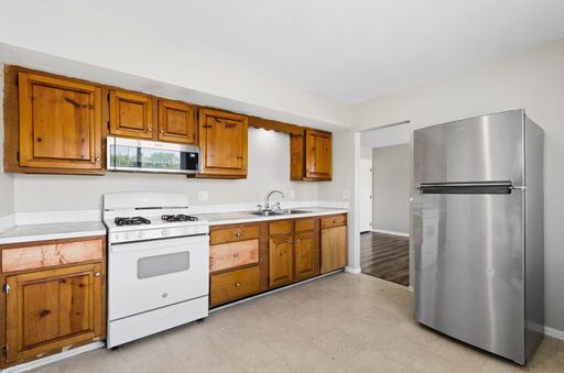 Beautifully Renovated 3-Bedroom Home with Attached Garage & Basement – photo 1