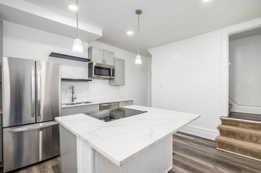 Fully renovated...extra half bath...laundry...storage! – photo 1