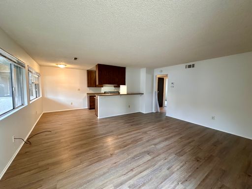 Downstairs 2 Bed 1.5 Bath Unit With All Newer Flooring – photo 1