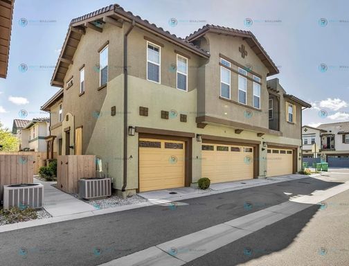Discover luxurious living in this stunning 3-bedroom, 2-bathroom, 2-story condo, perfectly designed for comfort and style. – photo 1