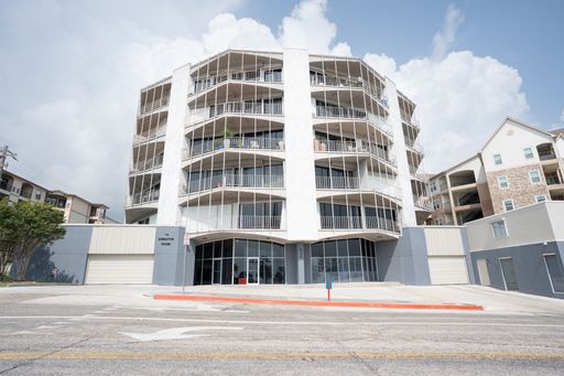 Sprawling 5th-Floor Corner Condo Just Steps from McGee Beach – photo 1