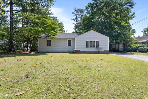 Charming 3BR/1.5BA Home in Established Northwoods Neighborhood! – photo 1