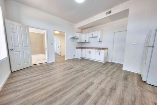 This updated 2-bedroom, 1-bath apartment offers comfortable living with modern touches. PRICE REDUCTION! – photo 1