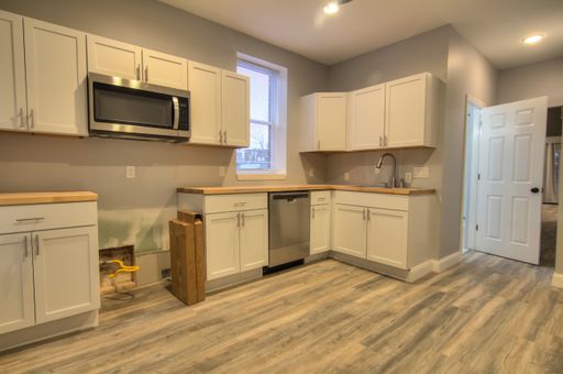 Brilliant completely rehabbed and renovated first floor 1 bed 1 bath apartment with all brand new features! – photo 1