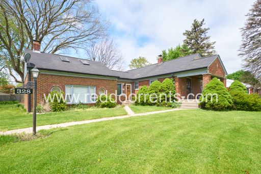 Charming 3-Bed Home with Separate Carriage Units in Indianapolis – photo 1