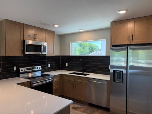 Move-In Special! Brand-New Townhome with 2-Car Garage – photo 1