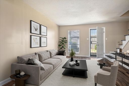 Experience True Townhome Living! Spacious 2 Bed / 1.5 Bath with In-Unit Laundry – photo 1