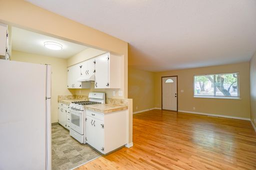 Charming Single-Level Duplex with Private Yard at Kenny Woods - COMING SOON! – photo 1