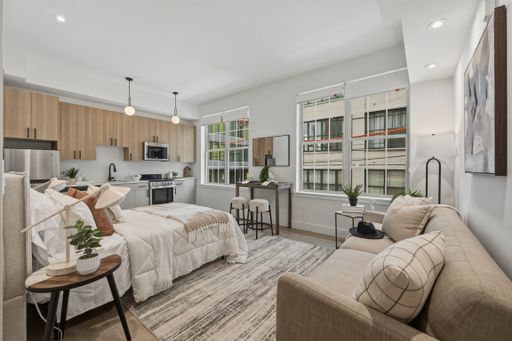 BRAND NEW! Large Studio with Defined Living Space – photo 1