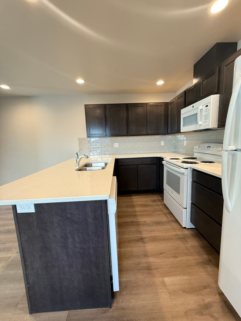 Charming 3 Bedroom Townhome 10 of 12