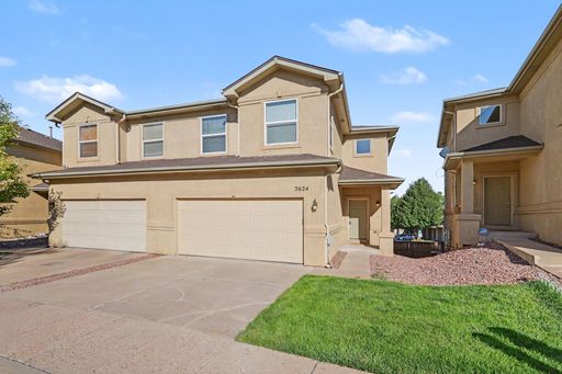 Beautifully Updated 3-Bedroom Townhome with Finished Basement, 2-Car Garage & Views – photo 1