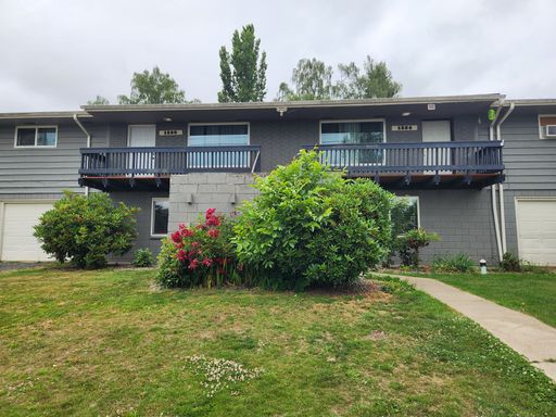 Triplex conveniently located near W.F. West High School.