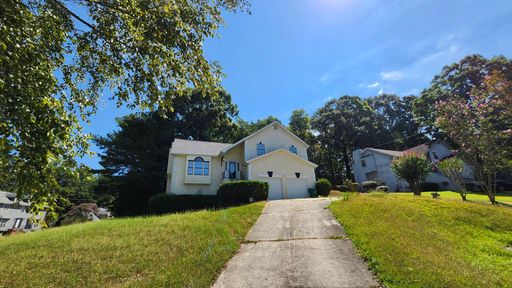 Spacious 5-Bedroom Home with Finished Basement Near Stonecrest Mall! – photo 1