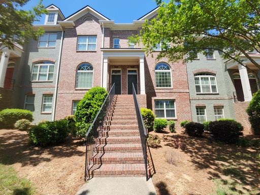Spacious Tri-Level Townhome in Gated Swim & Tennis Community – photo 1