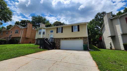 Spacious 4BR Split-Level Home with Fireplace & 2-Car Garage – photo 1