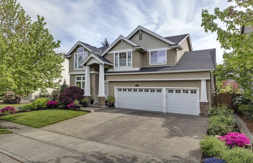 Spacious 4 Bedroom Home with Gourmet Kitchen, 3-Car Garage, Flexible Living Spaces & Covered Backyard Deck – photo 1