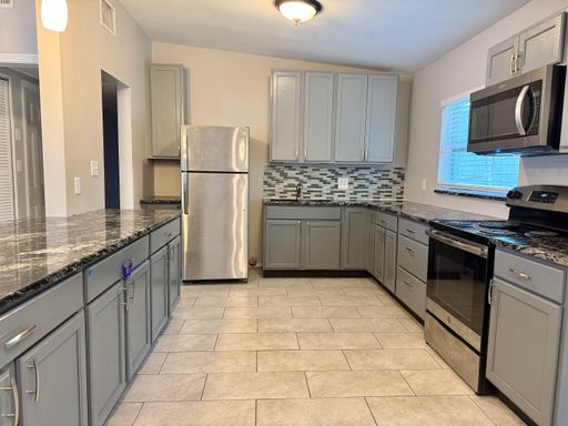 $1,800 | 3/2 Updated Kitchen and Bathrooms, Washer/Dryer and Fenced Yard - Orlando – photo 1