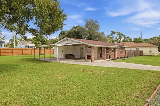 Tampa Home with Large Fenced Yard & Covered Parking – photo 1