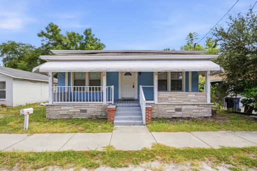 Charming 3-Bedroom Home in Historic Ybor City with Open Floor Plan & Vaulted Ceilings – photo 1