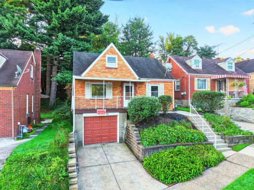 Charming 3-Bedroom Home with Garage, Porch & Spacious Yard