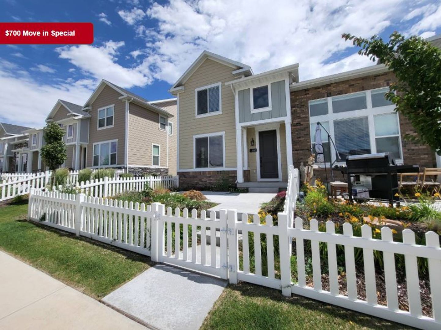 Pet Friendly Gorgeous Row End Townhome w 2 car attached garage!