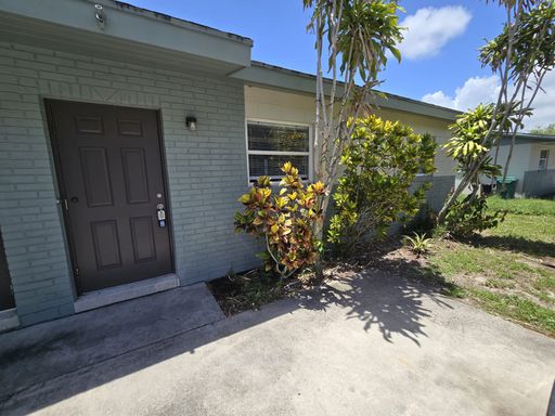 Beautiful open floor plan 2 bedroom 1 bathroom home, 2 car parking. Open kitchen with wood cabinets and newly installed tile flooring throughout the home. – photo 1