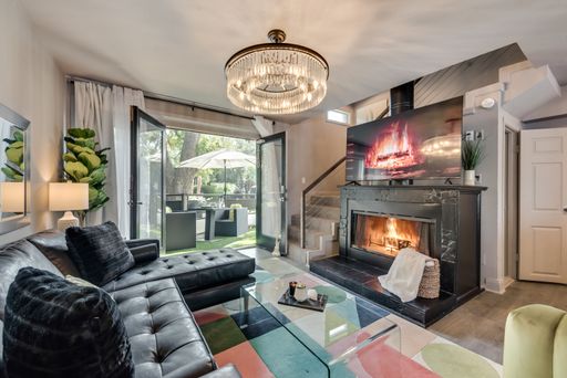Spacious 1-bedroom plus additional loft space with fireplace and resort pool – photo 1