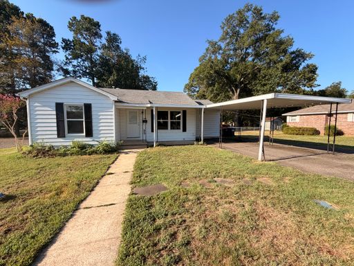 This two-bedroom, one-bath home in Russellville, AR – photo 1