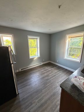 Welcome to 1039 Main Street, Unit 5, Worcester, MA—an updated 3-bedroom apartment offering modern finishes, a functional layout, and comfortable living in a convenient Worcester location. – photo 1
