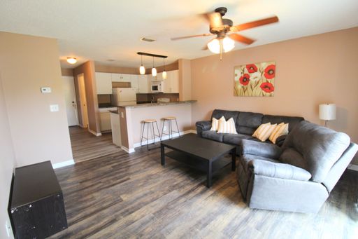 4 bedroom - 2 bath condo- Furnished with Electric and Water Included! - Pre leasing for the 2027-2028 school year! – photo 1