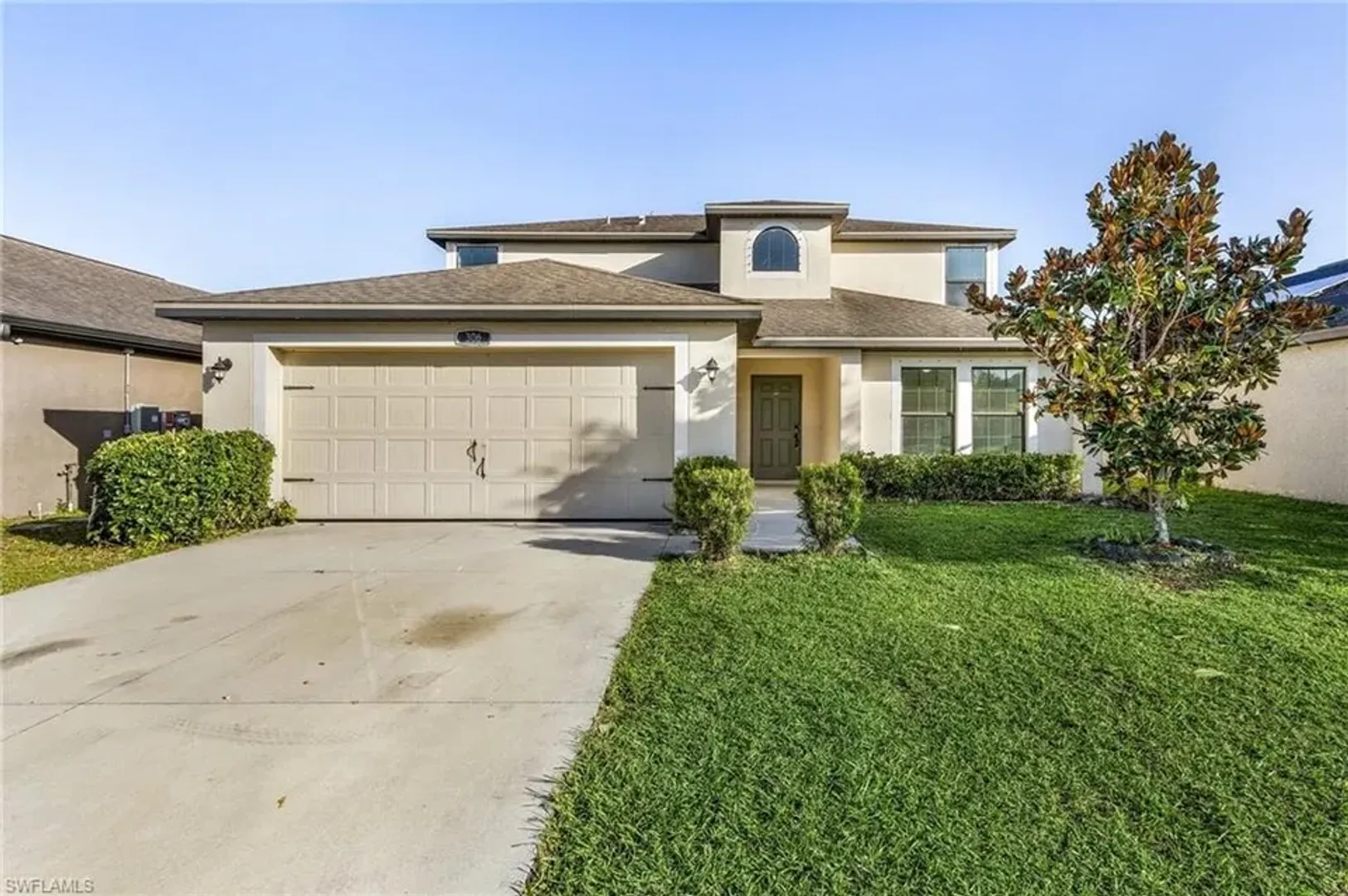 LEHIGH ACRES House: 306 SHADOW LAKES DR