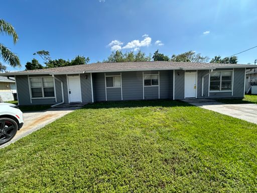 Coming Soon! 3/2 All tile duplex – photo 1