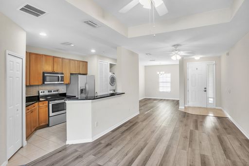 Welcome to this 2 bedroom, 2 bathroom condo in the wonderful community of Palencia.