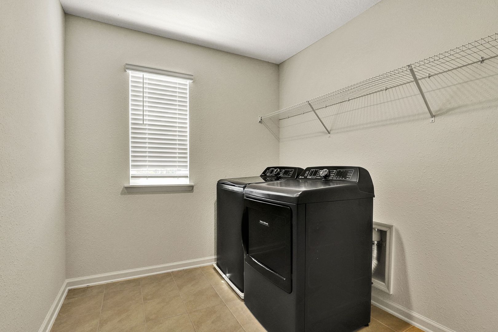 Laundry room at 11321 Panther Lake CT