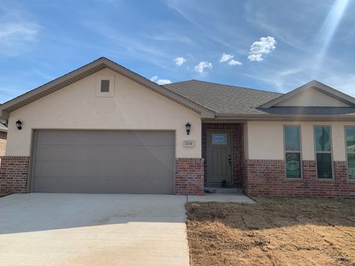 Modern 3-Bedroom Home with Open Floor Plan, Covered Patio & Fenced Yard in Centerton! **Promotion Available** – photo 1