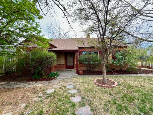 Charming 3-Bedroom Denver Home with Sunroom & Attached Garage – photo 1