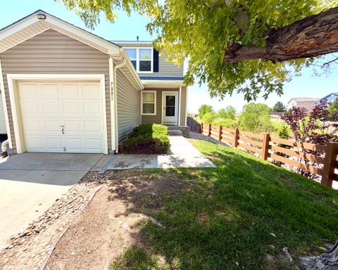 3-Bedroom Englewood Townhome with Attached Garage & Trail Views – photo 1