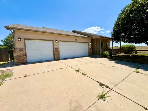 Beautiful 4-Bedroom Corner Lot Home with 3-Car Garage in Milliken