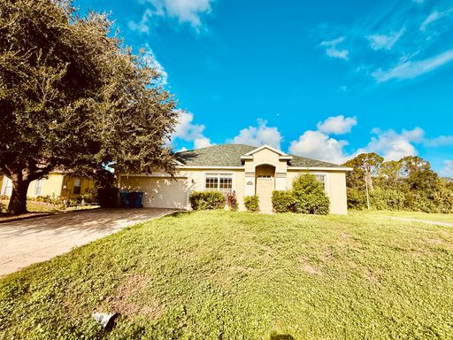 3 Bed 2 Bath Home in Port Malabar – photo 1