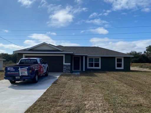 *** 500 DOLLARS OFF FIRST FULL MONTH RENT *** Custom Home - Desirable SE Ocala Neighborhood 3/2/2 **Won't Last** – photo 1