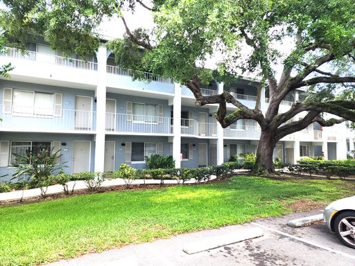 Second Floor Condo Unit with All-Tile Flooring and Water Included – photo 1