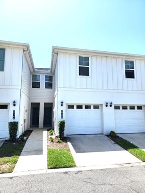 Two Story Townhouse with Open Floor Plan, Garage, Screened Patio and Laundry – photo 1