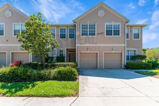 Beautiful 3/3 townhome in a great location! – photo 1