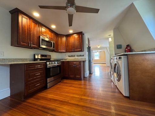 Stylish 2BR Condo with Private Deck & In-Unit Laundry – Prime Peabody Location!