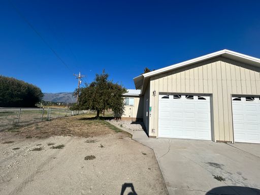 1 Bed, 1 Bath, with garage in a country setting.
