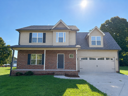 Move In Special! Beautiful 4BD/2.5BA Greensboro Home - Western School District – photo 1