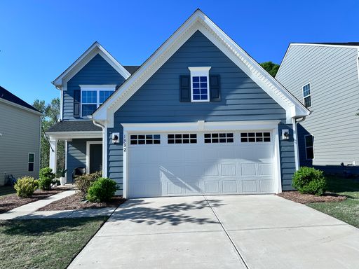 Discover the charm and elegance of this 2022 3-bedroom, 2.5-bath Single Family home with expansive living space, private fenced backyard and electric car port – photo 1