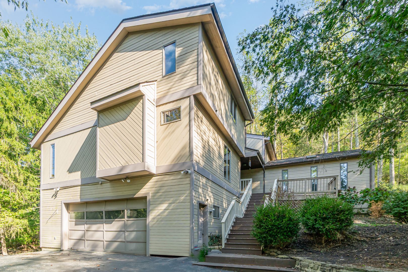 Stunning 4-Bedroom Home with 5 Full Baths + Hot Tub, Wooded Retreat