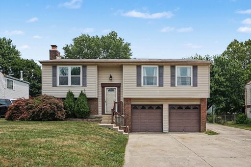 Updated 3 Bedroom Home with Covered Deck, Detached Workshop Garage & Finished Lower Level – photo 1
