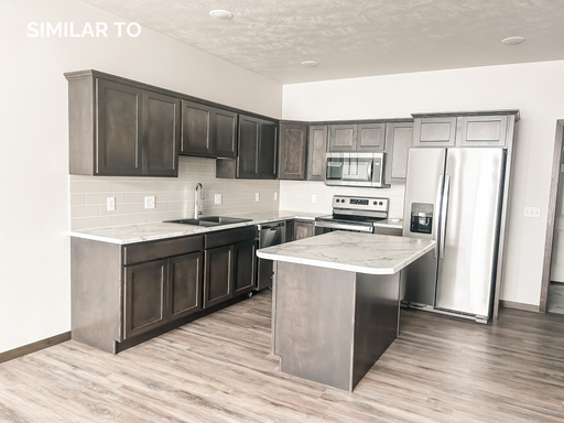 Stunning 3-Bedroom Townhome in Southeast Sioux Falls – photo 1